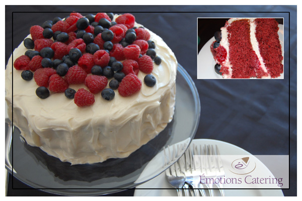 Delicious Red Velvet Cake topped with Cream Cheese Icing and Fresh Fruits